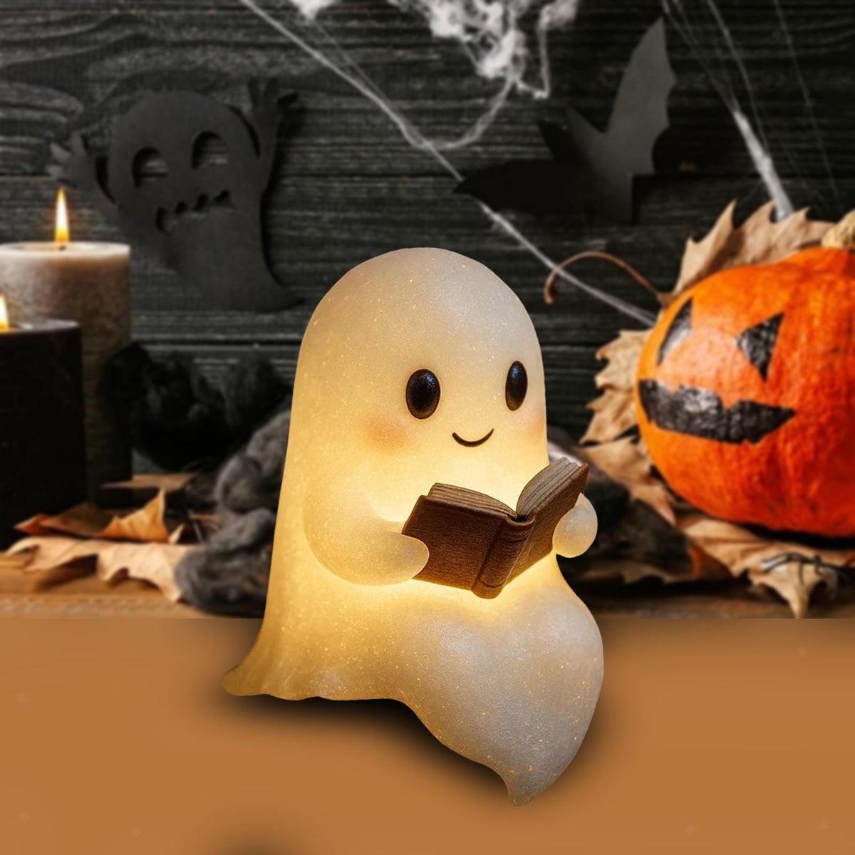 Fantasmino in resina con libro illuminato, decorazione di Halloween